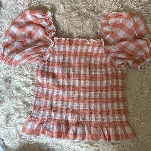 New A pink and white checkered puff sleeve shirt